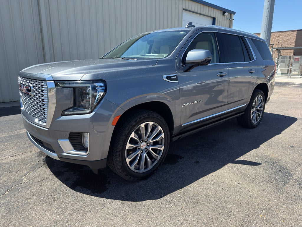 2021 GMC Yukon Denali in Satin Steel Metallic — front three-quarter view