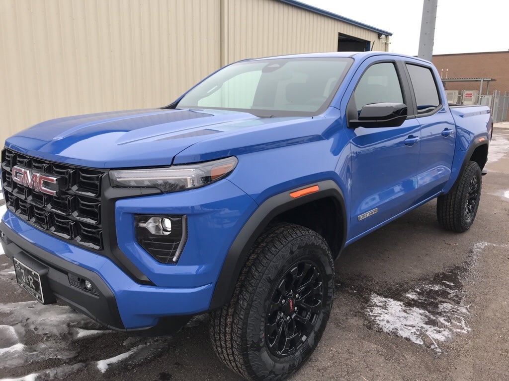 2026 GMC Canyon Elevation in Rapids Metallic — front three-quarter view