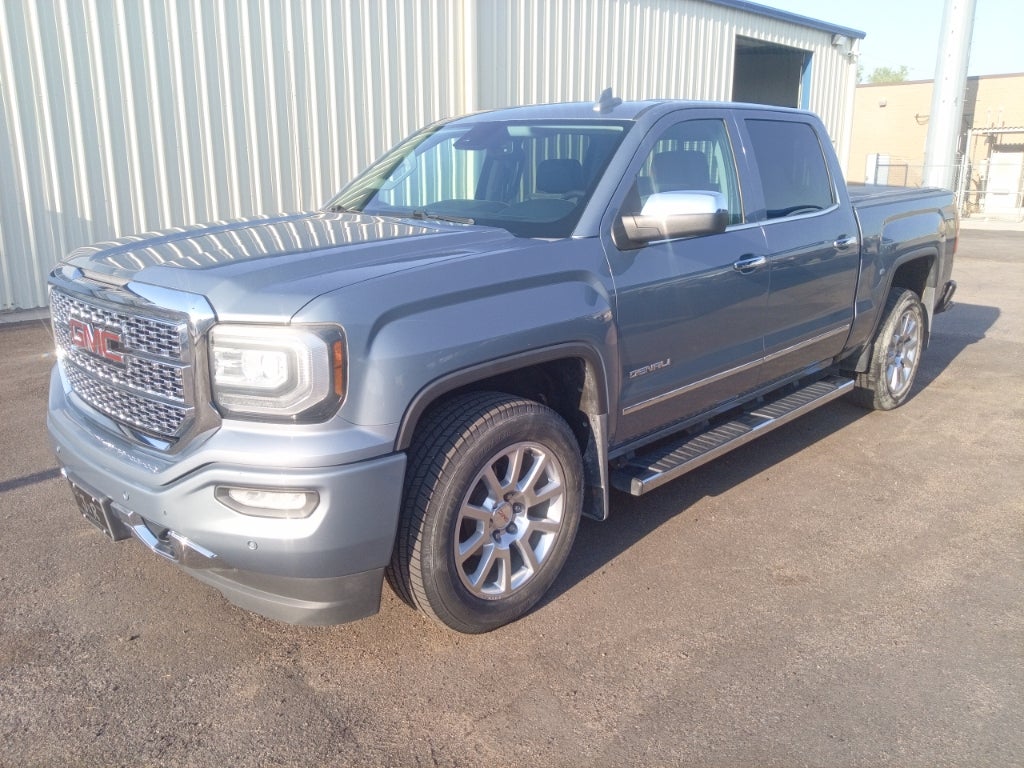 2016 GMC Sierra 1500 Denali in Light Steel Gray Metallic — front three-quarter view