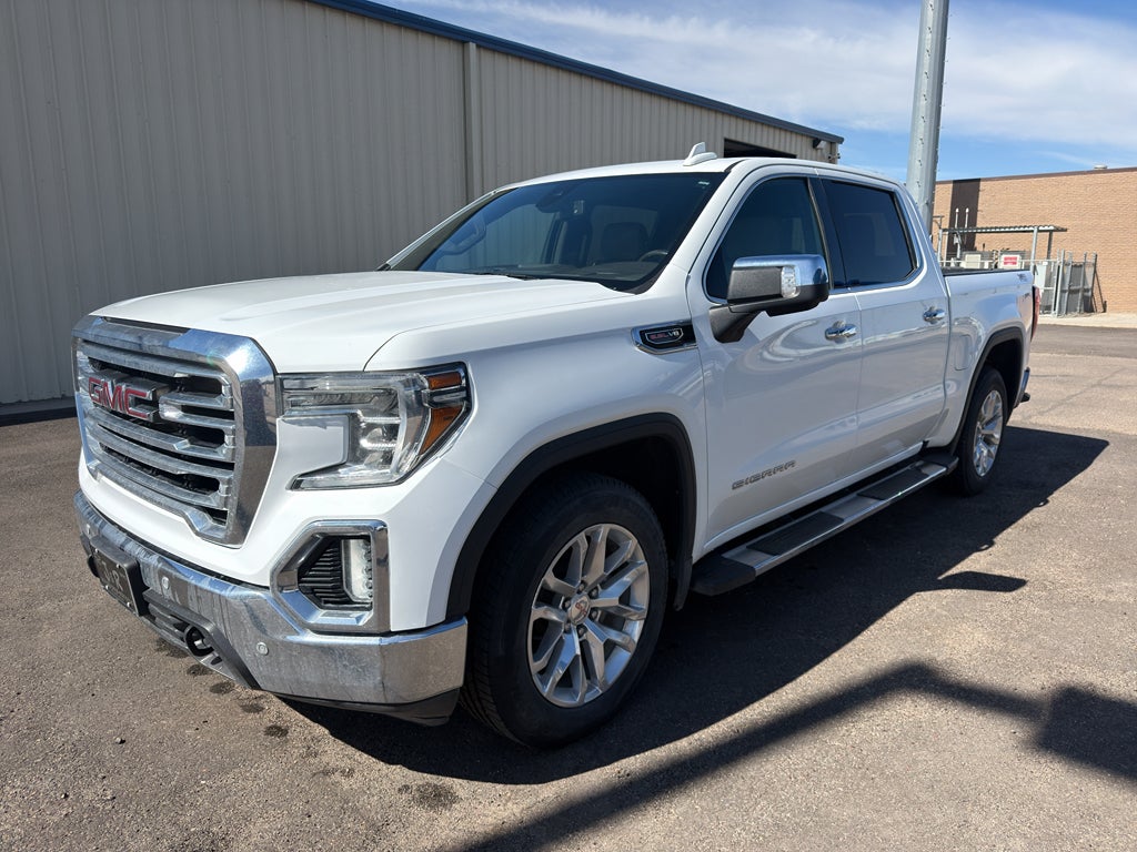 2019 GMC Sierra 1500 SLT in Summit White — front three-quarter view